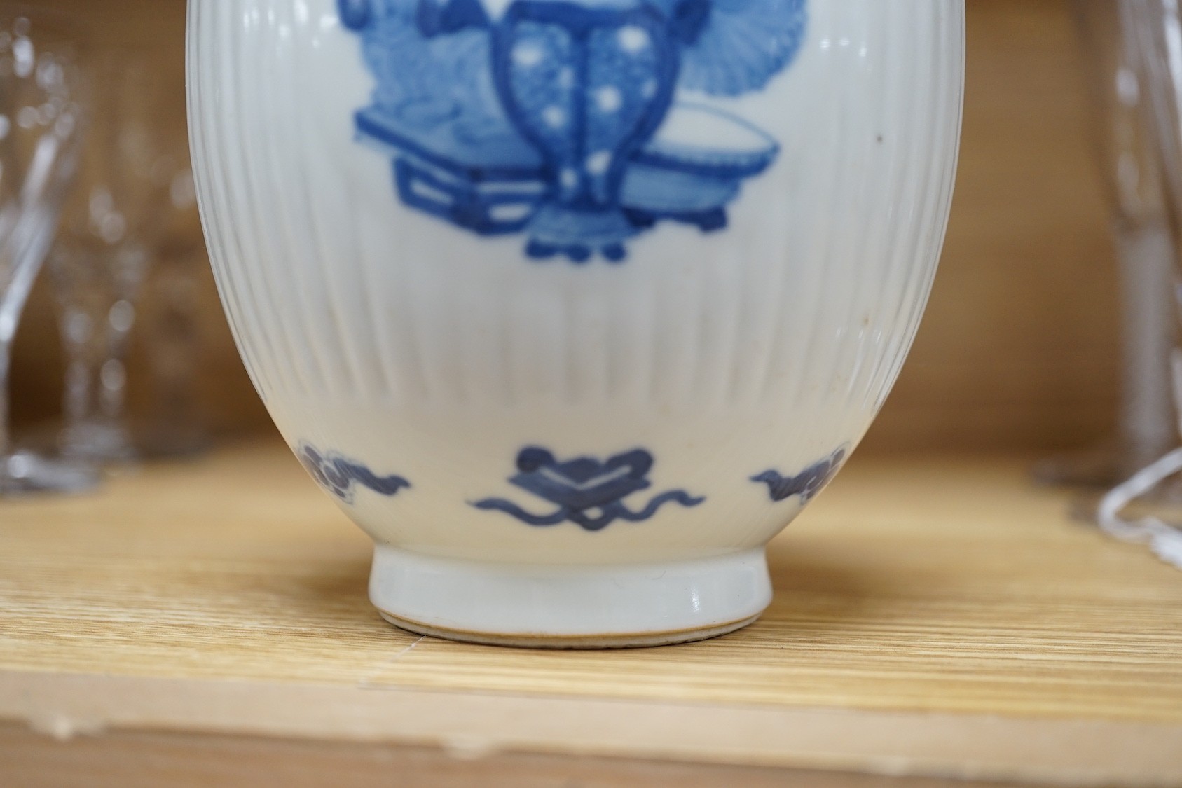 A Chinese blue and white fluted ovoid jar 16cm